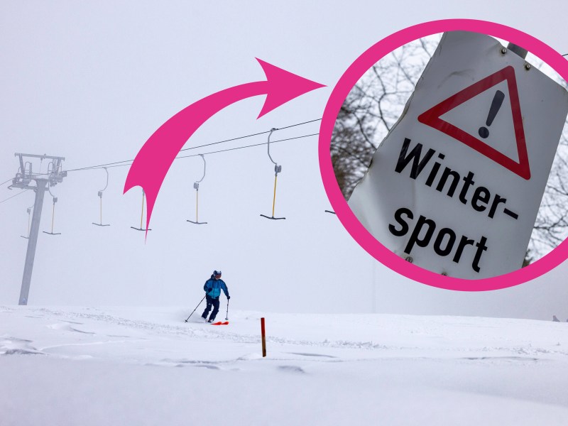 Eine vereinsamte Skipiste in Thüringen. Ein Pfeil zeigt auf ein Warnschild mit der Aufschrift 